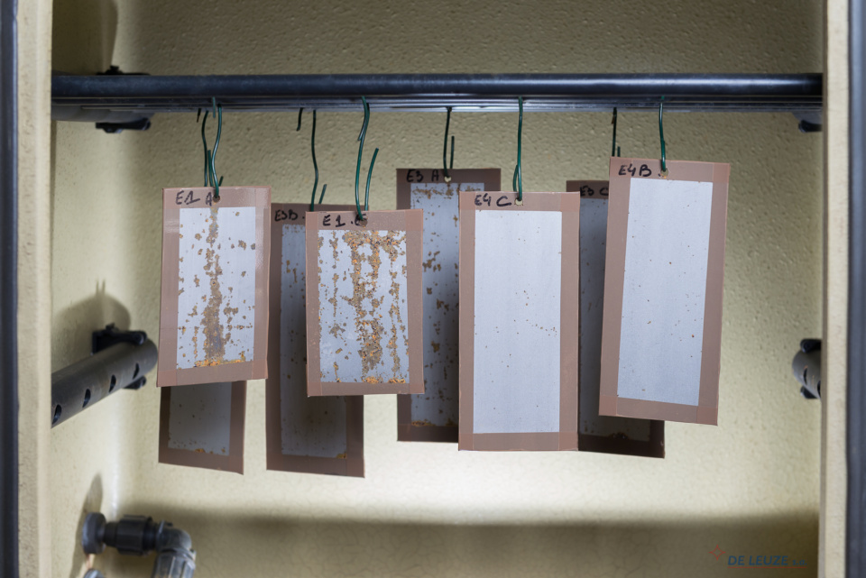 steel samples hanging in a climate chamber Rust prevention additives. Corrosion tests of steels samples in climate chamber